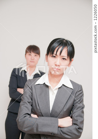 Businesswoman making arms 1226050