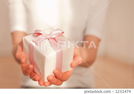 A woman with a present A woman with a present 1231474