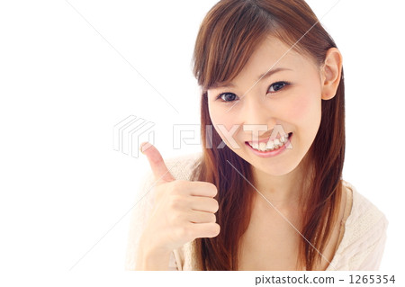 A woman who raises his / her thumb A woman who raises his / her thumb 1265354