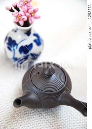 A cherry tree with teapot and Japanese cloth 1292711
