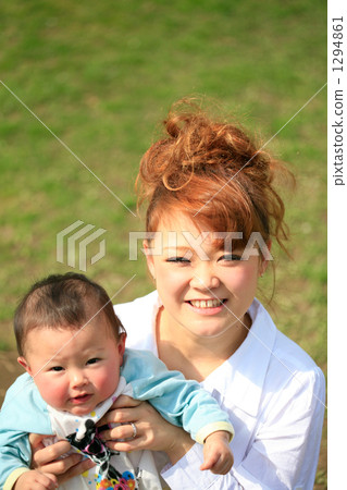 Baby and smiley mama Baby and smiley mama 1294861