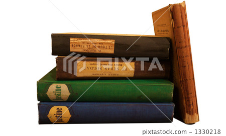 Old books lined up on bookshelves 1330218