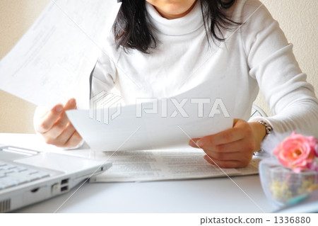 Business woman confirming turning document Business woman confirming turning document 1336880