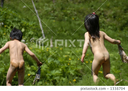 Child playing with a dragon in nature 1338704