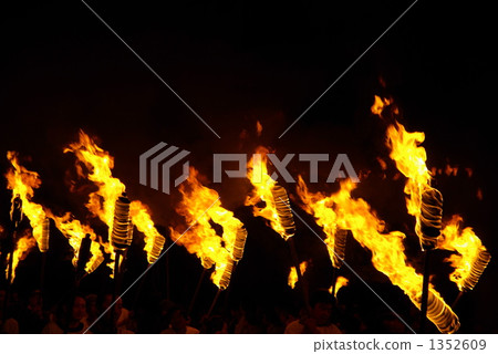 A row of torches A row of torches 1352609