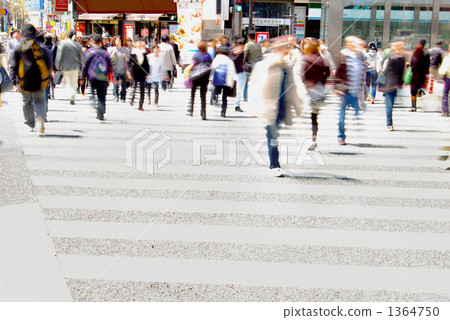 People crossing a pedestrian crossing People crossing a pedestrian crossing 1364750