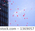 Heart shaped balloons dancing in the city Heart shaped balloons dancing in the city 1369057