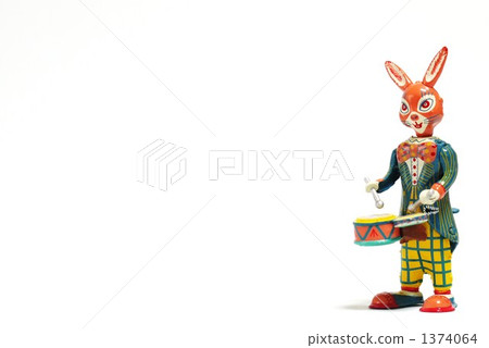 A rabbit striking a drum 1374064