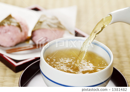 Japanese tea and cherry rice cake Japanese tea and cherry rice cake 1381482