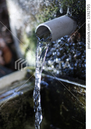 Well water flowing in the shrine 1392705