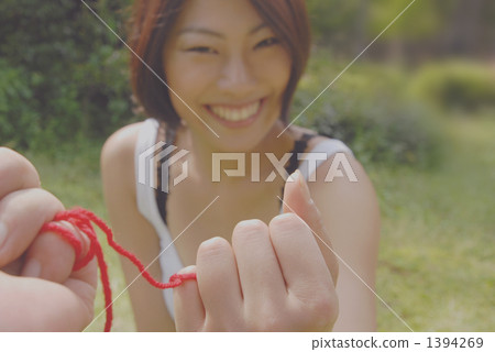 red string, tying red cords, knot 1394269