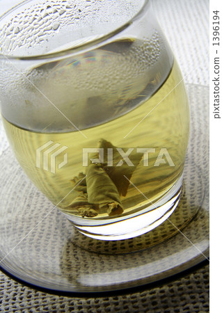 Chinese "Kudingcha" in a transparent glass 1396194