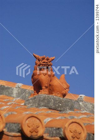 Shisa on the red tile roof Shisa on the red tile roof 1399744