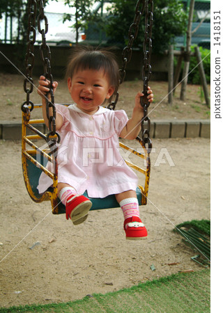 Girl on a swing Girl on a swing 1418151