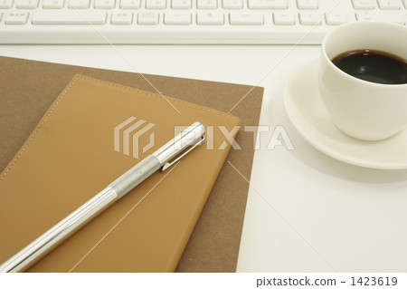 A notebook on the desk 1423619