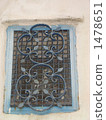 Decorative window that shines in Ostuni's white house 1478651