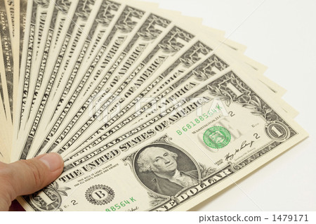 Women's hand with a dollar bill 1479171