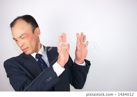 Puzzling middle-aged businessman 1484012