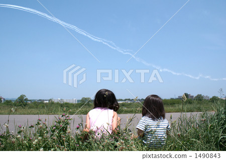 A child looking up at the airplane cloud A child looking up at the airplane cloud 1490843