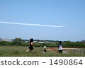 A girl chasing the airplane cloud 1490864