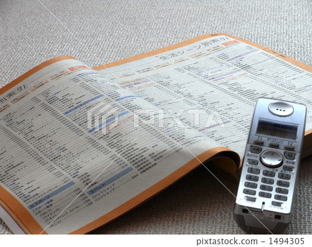 cordless, a telephone book, a telephone directory 1494305