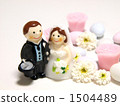 Bridal candles and flowers and dragees 1504489
