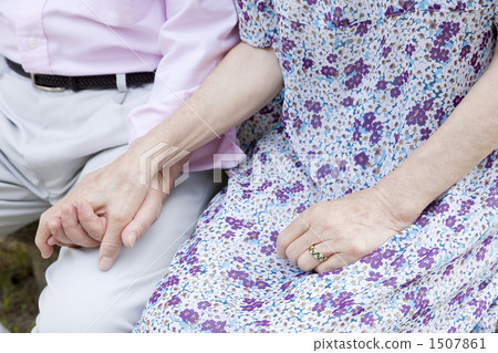 Senior couple holding hands Senior couple holding hands 1507861
