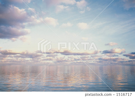 Evening clouds in the sea 1516717