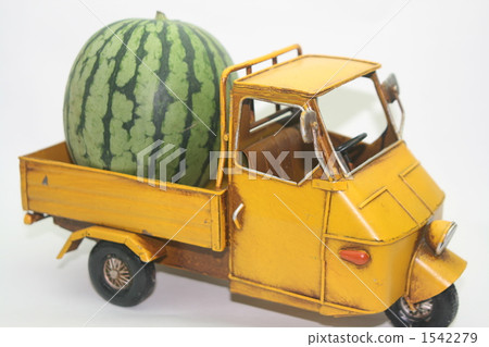 Yellow truck and watermelon Yellow truck and watermelon 1542279