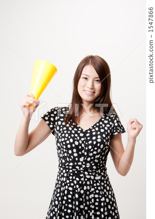 Women in their twenties with megaphone Women in their twenties with megaphone 1547866