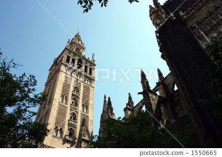 Tower of Giralda in Seville Cathedral called Kazami which is high in the city of Seville 1550665