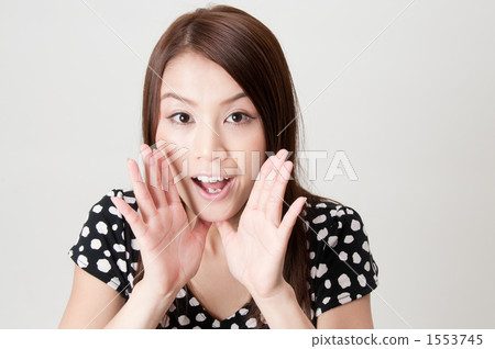 A whispering woman in her twenties 1553745