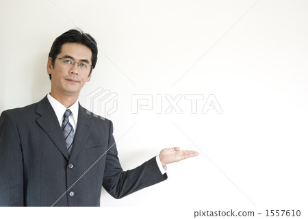 A businessman guiding 1557610