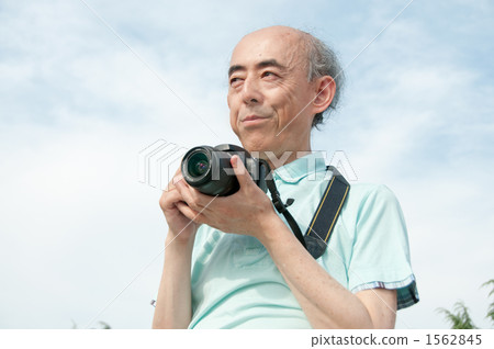 Senior with camera Senior with camera 1562845