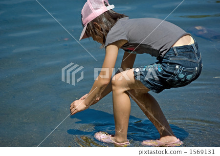 A fish girl holding a fish 1569131