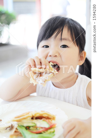 A young girl hanging on waffle 1594280