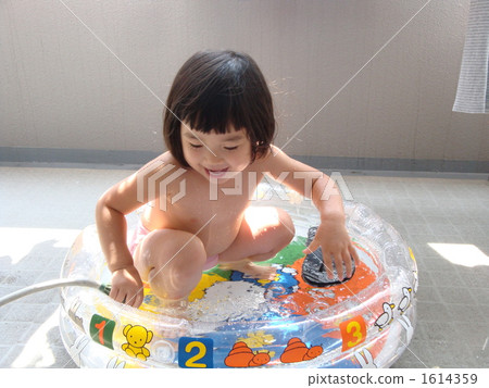 Daughter's water play 1614359