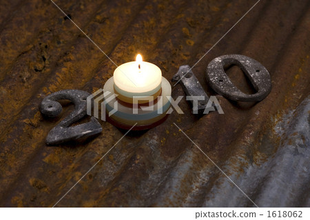 2010 letters made with metal plate and candle 2010 letters made with metal plate and candle 1618062