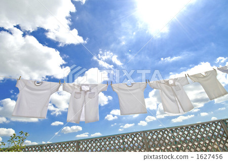 laundry, hanging out laundry to dry, summer clouds 1627456
