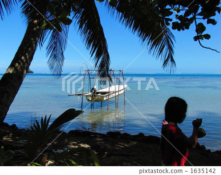A coast and a girl in a tropical country 1635142