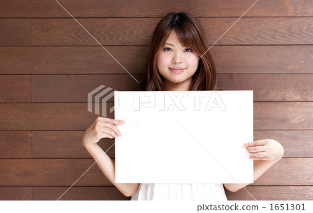 A girl with a message board A girl with a message board 1651301
