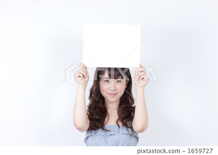 A girl with a message board A girl with a message board 1659727