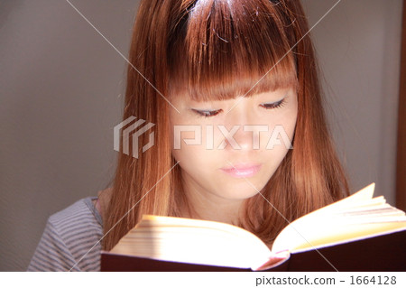 A woman reading A woman reading 1664128