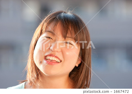 Smiling female college student 1667472