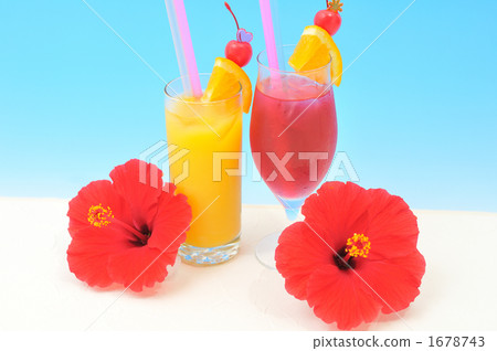 Cold hibiscus tea and tropical style orange juice. Cold hibiscus tea and tropical style orange juice. 1678743