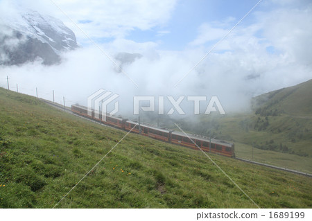 Climbing train splitting the fog 1689199