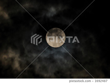 A moon peeping through the clouds (full moon) 1692487