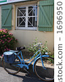 Bicycle and window Bicycle and window 1696950