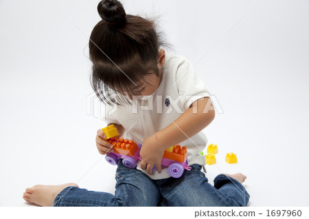 Girls playing with blocks 1697960