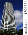 High-rise apartment and clouds 1700774